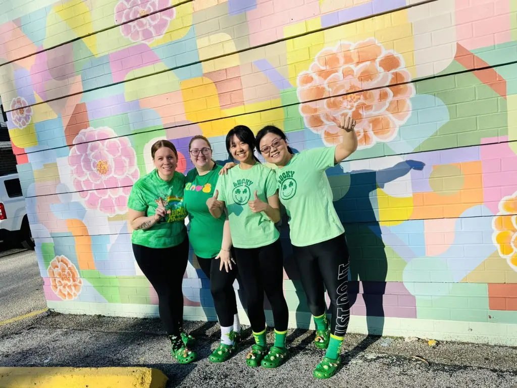 judys cafe colorful wall green shirts