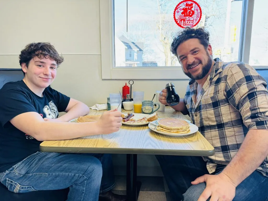 two men with pancakes at judys cafe